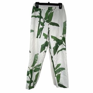 A Peach banana leaf design pants. Size Small